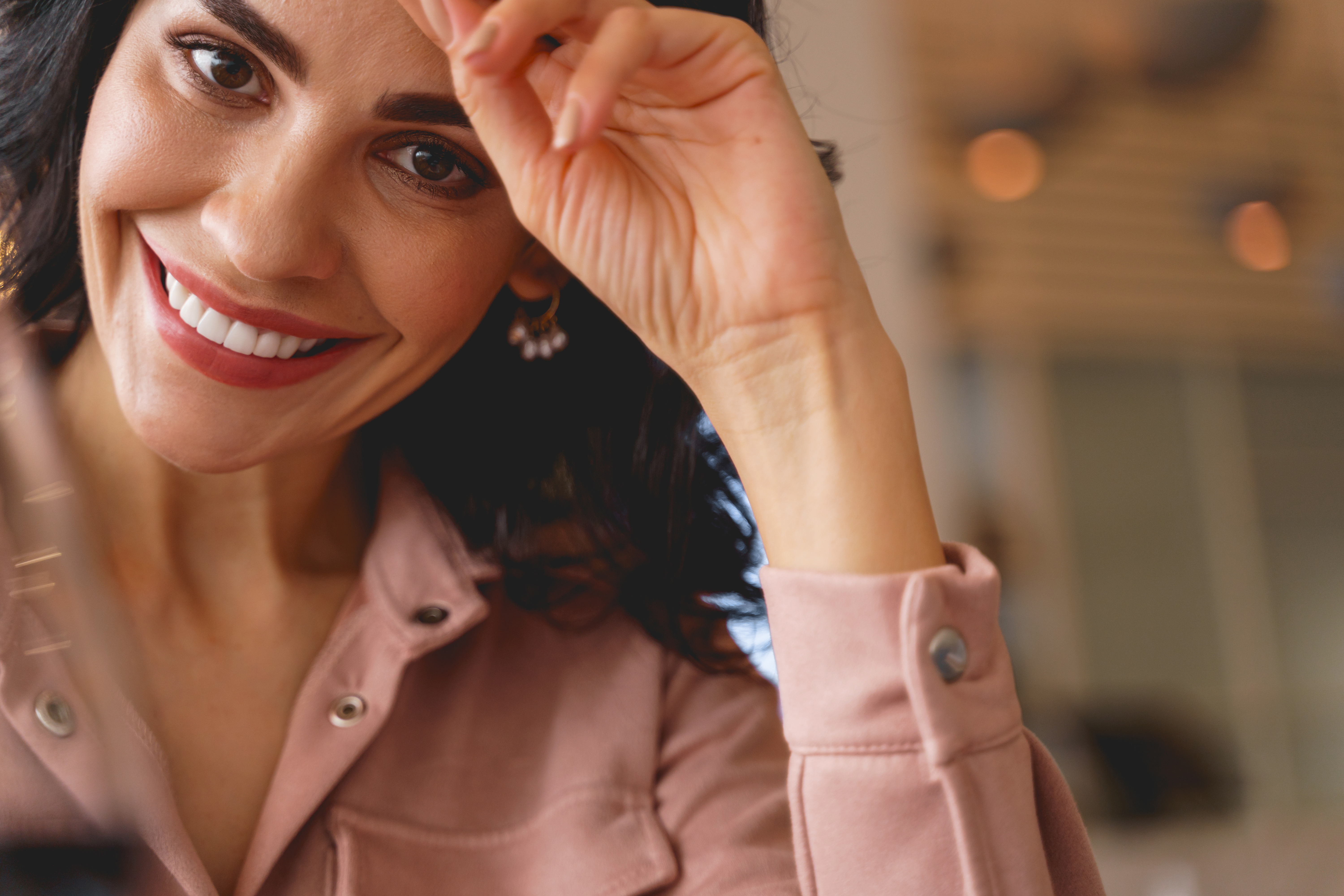 Beautiful lady with charming smile expressing positive emotions