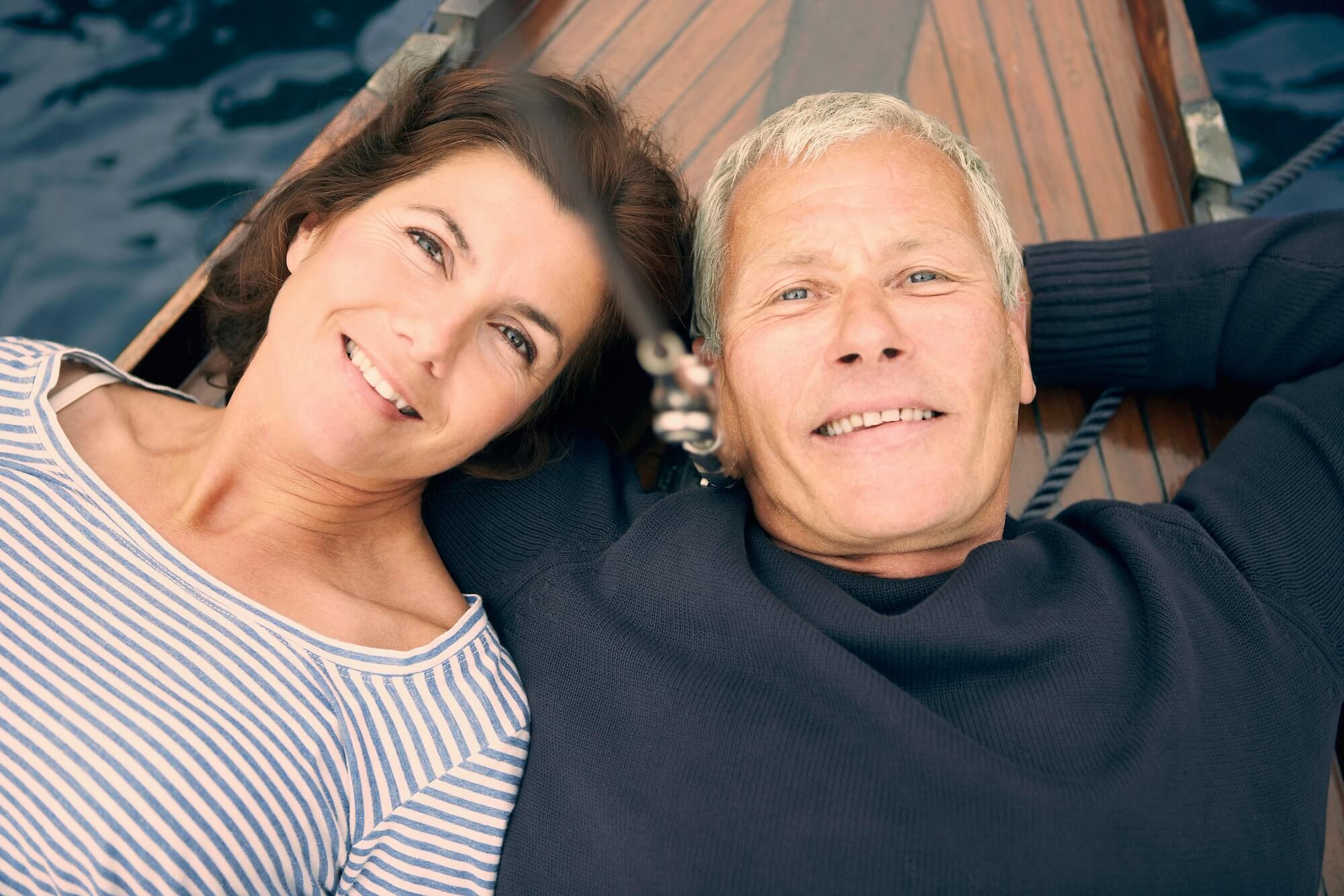 Middle aged couple on boat (portrait)